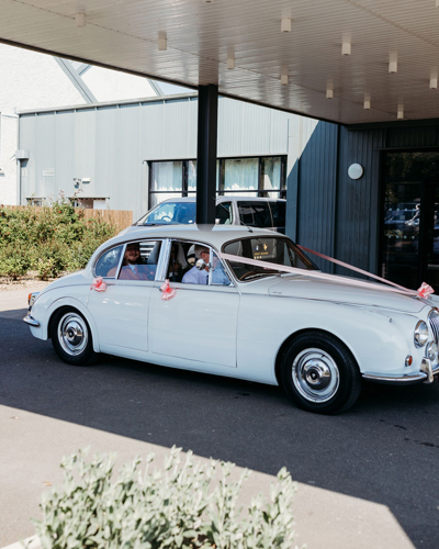 Stylish Wedding Car Arrival at Comis Hotel Weddings Isle of Man